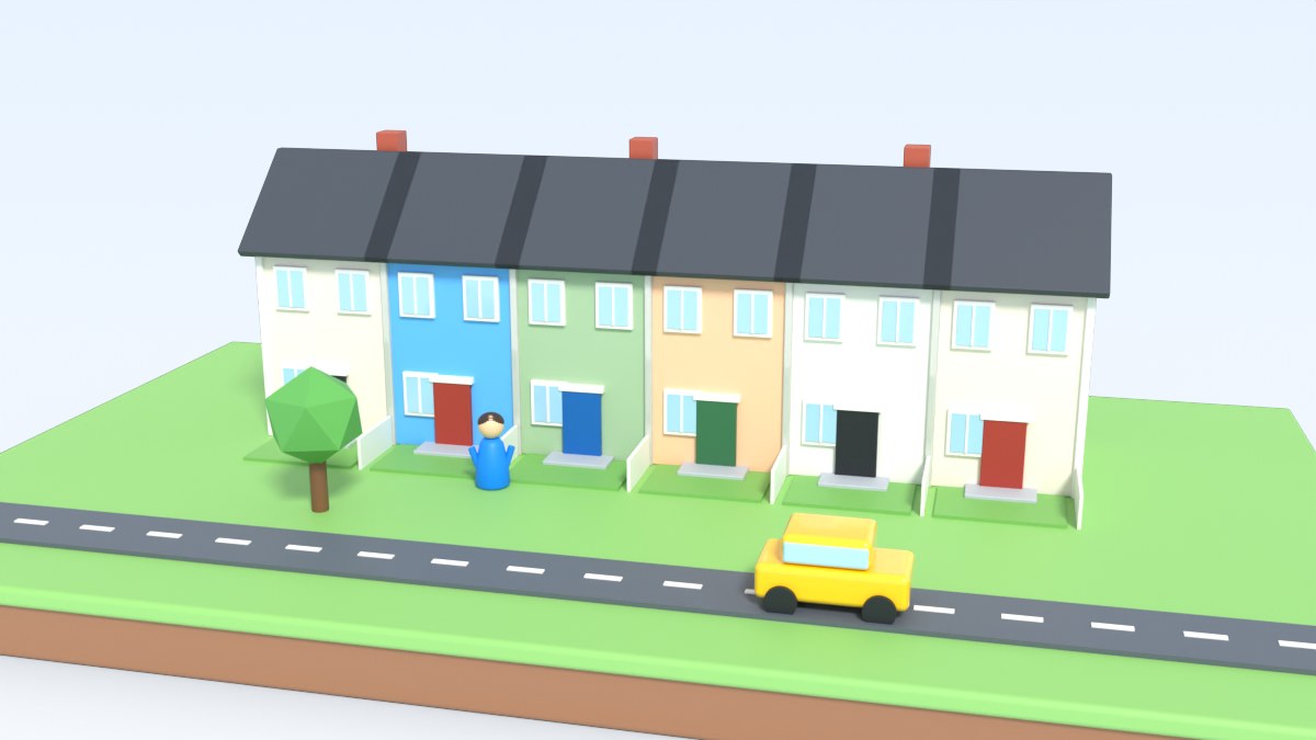 A row of colourful terraced houses with small front gardens