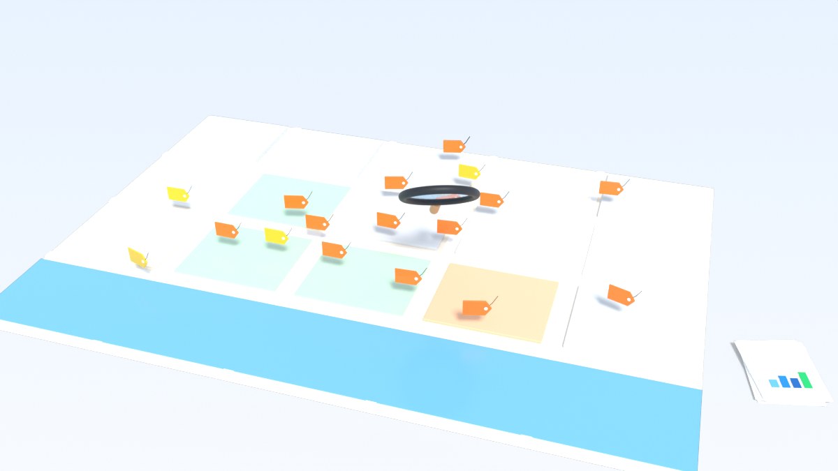 A paper city map is full of small orange price tags, with a magnifier over it