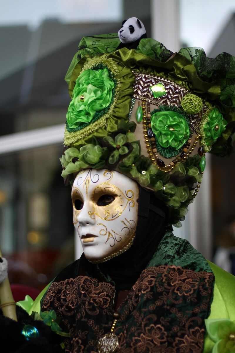 Colorful carnival masks in a row