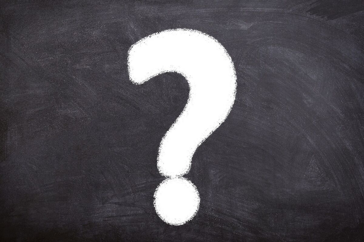 A chalkboard with a large question mark