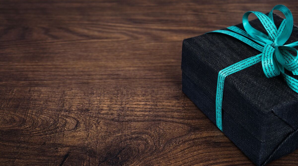 A wrapped gift box with a ribbon